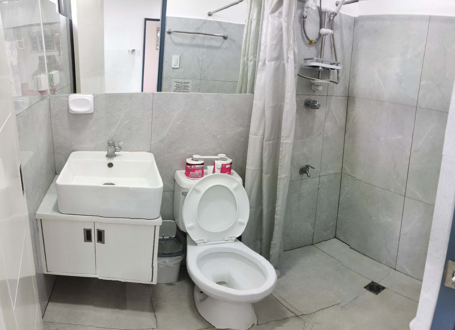 Doctor A CondoSuites second bathroom view with sink and shower